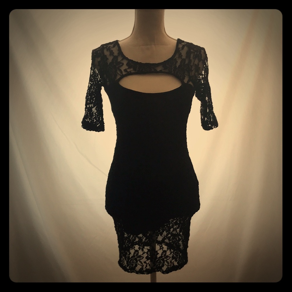 Black Lace dress with mid arm sleeves.